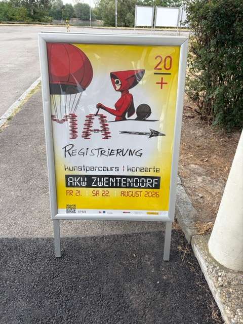 Foto des Plakats der IMA20+ Veranstaltung mit Wegweiser zur Registrierung